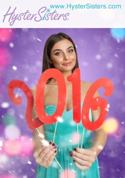 brunette woman holding 2015 for new year